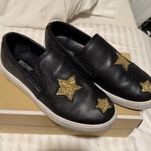 Michael Kors Black Sneakers with Gold Star Accents